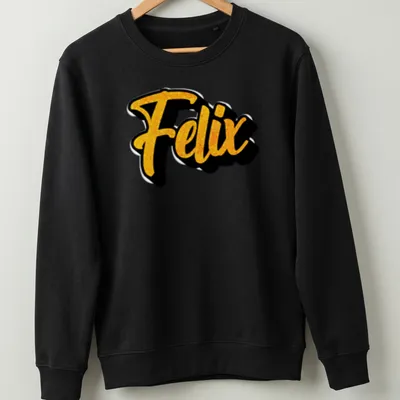 Personalized t-shirt with bold script reading 'Felix' in gold and black — printed on a unisex sweatshirt