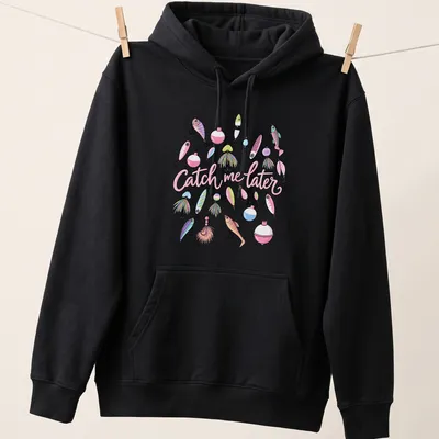 Pastel illustrated fishing lures with playful text 'Catch me later' on a — printed on a unisex hoodie
