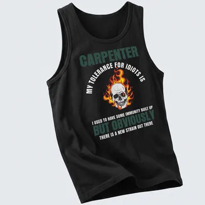 Bold graphic of a flaming skull with text 'CARPENTER BUT OBVIOUSLY' in black and orange — printed on a tank top
