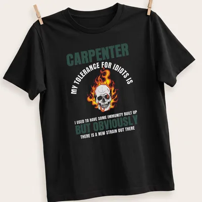 Bold graphic of a flaming skull with text 'CARPENTER BUT OBVIOUSLY' in black and orange