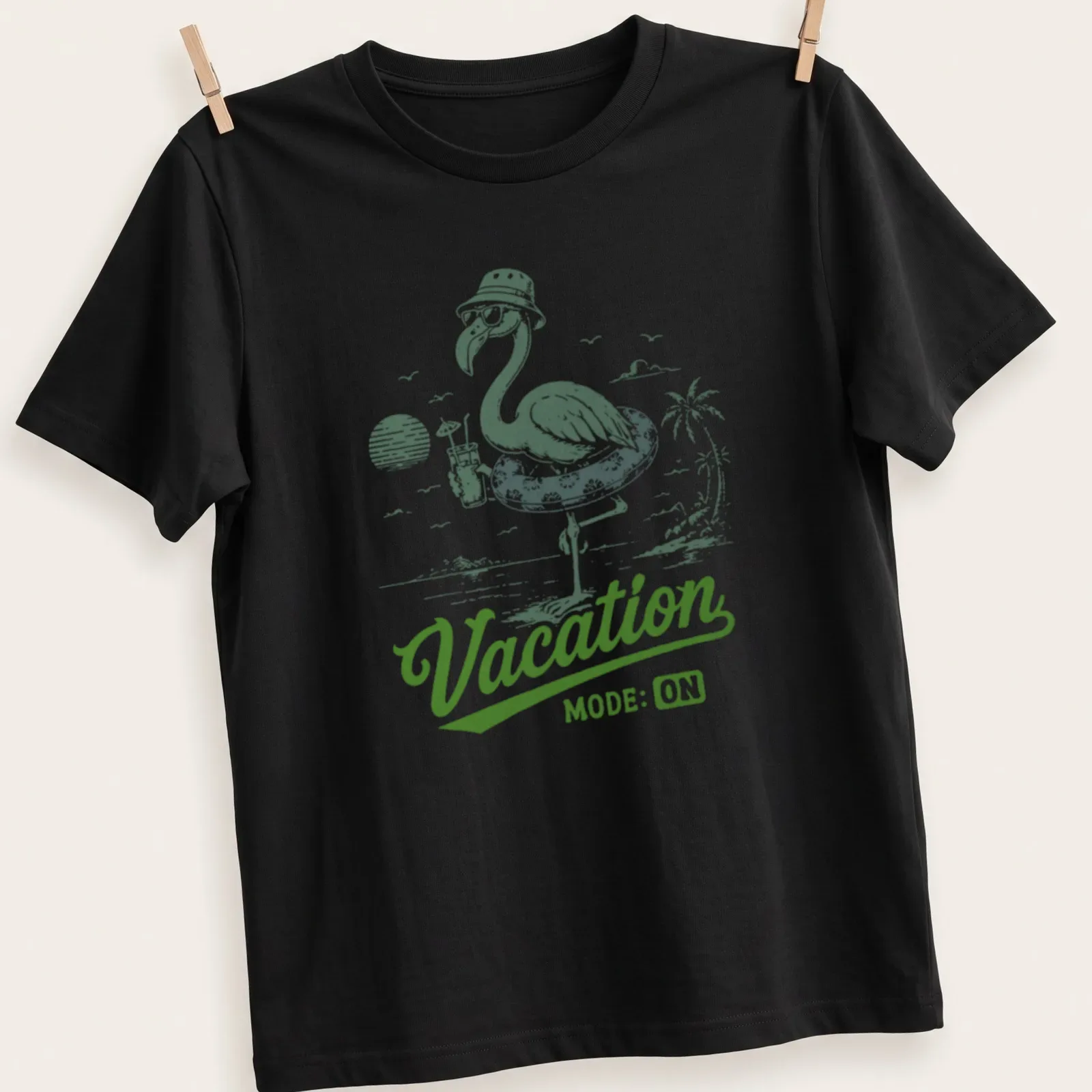 Vintage illustration of a flamingo with text 'Vacation MODE: ON' in green and white — printed on a unisex t-shirt