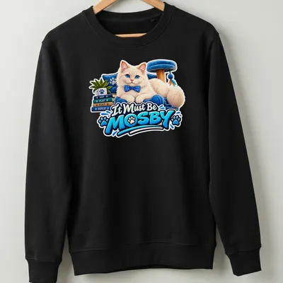 Colorful cartoon of a fluffy white cat with the text It Must Be MOSBY. — printed on a unisex sweatshirt