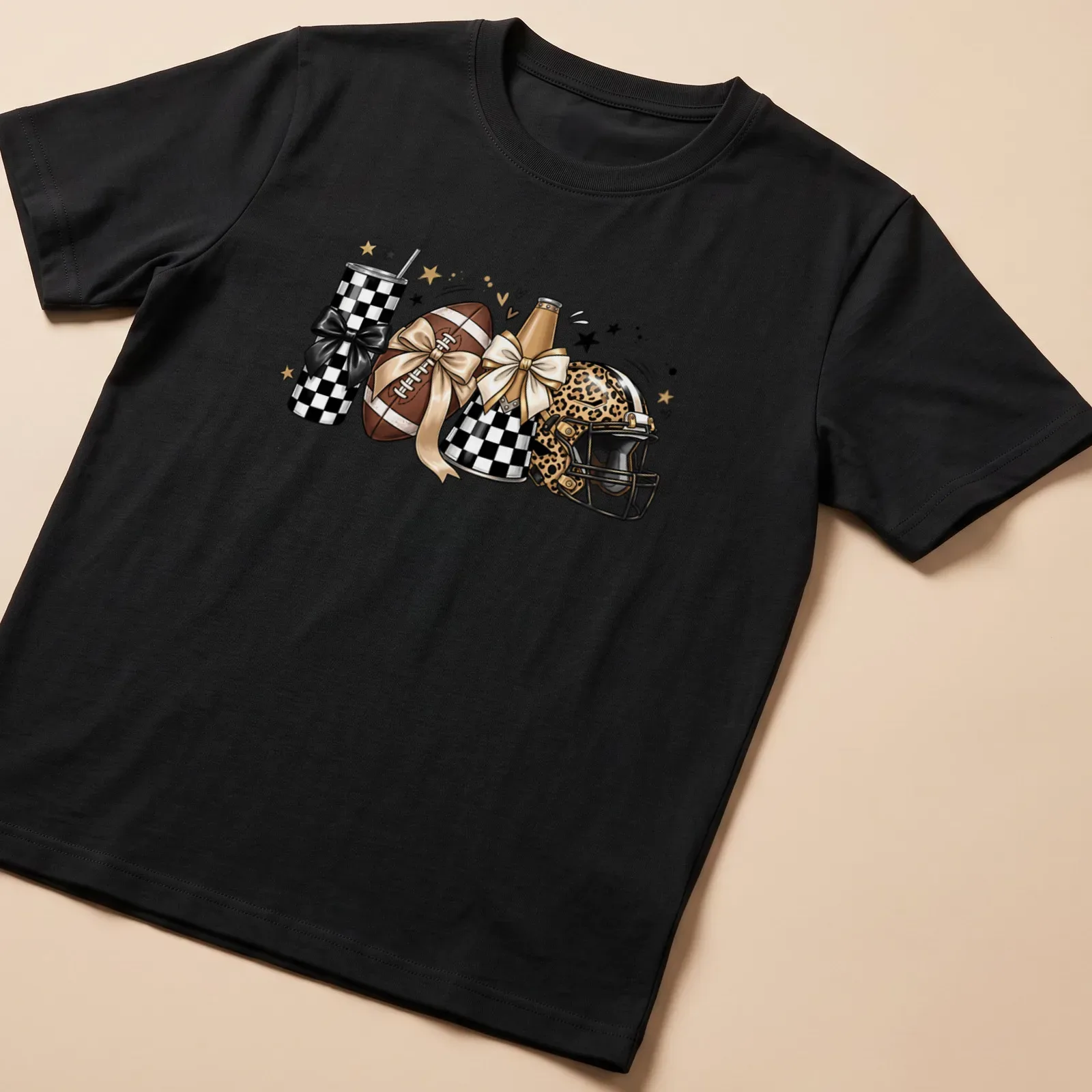 Cute football-themed t-shirt with leopard print helmet, tumbler, and bows — printed on a unisex t-shirt