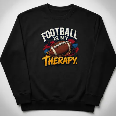 Vintage distressed t-shirt proclaiming football as therapy with colorful graphics — printed on a unisex sweatshirt