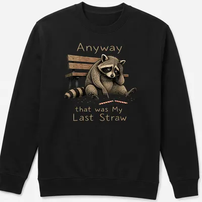 Illustrative t-shirt featuring a raccoon and humorous text about frustration. — printed on a unisex sweatshirt