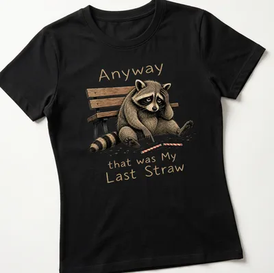 Illustrative t-shirt featuring a raccoon and humorous text about frustration. — printed on a women's shirt