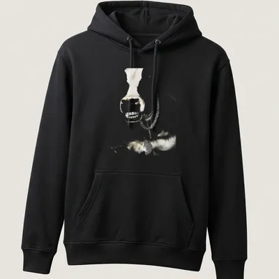 Realistic cow wearing a grillz chain in hip hop style with gold and black accents — printed on a unisex hoodie