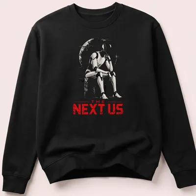 Silhouette of humanoid robot with 'THE NEXT US' text in red, white, and gray. — printed on a unisex sweatshirt
