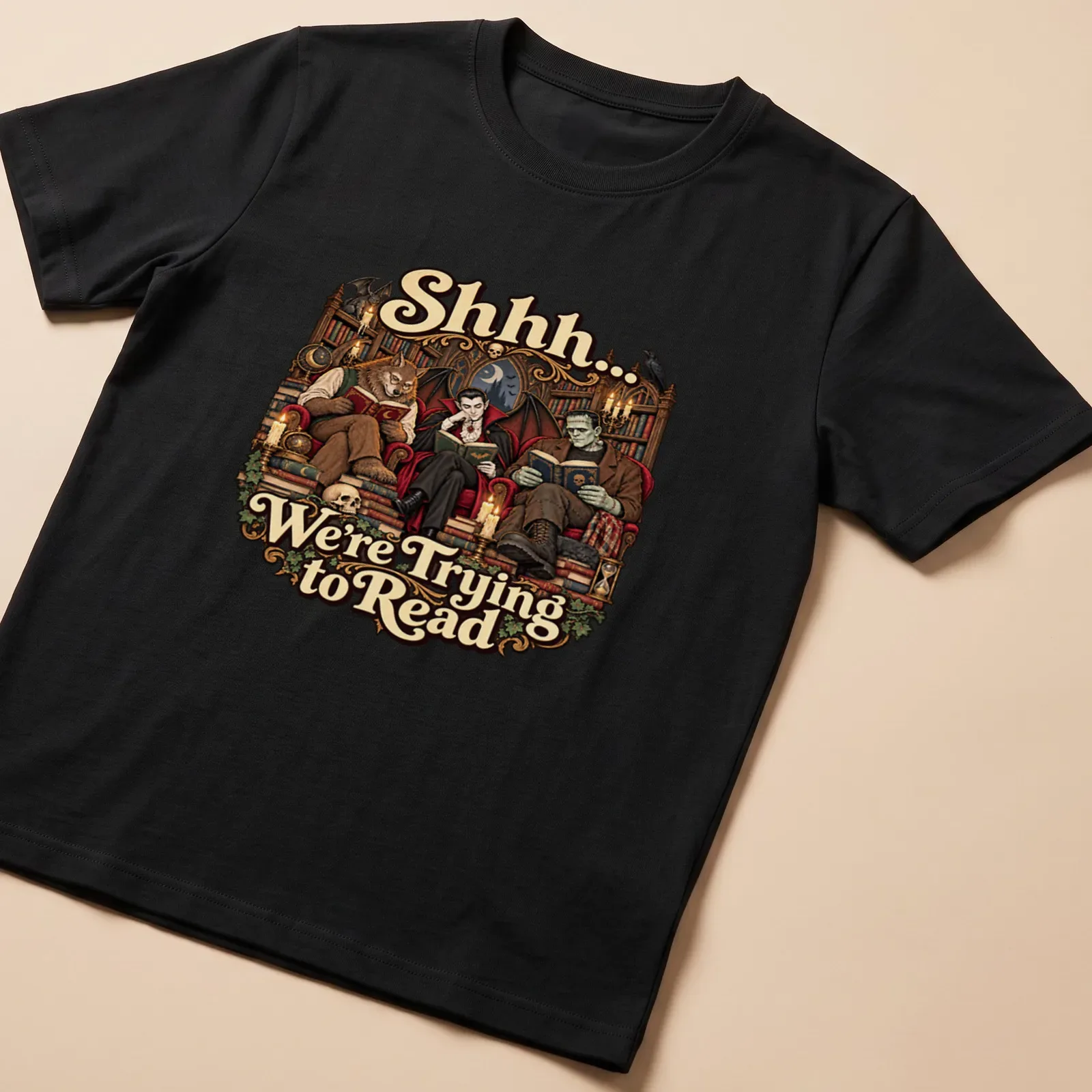 Gothic monsters reading with whimsical text on a dark-themed — printed on a unisex t-shirt