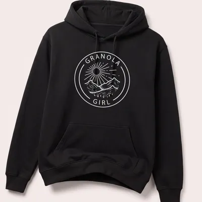 Illustration of a Granola Girl hiking in nature with mountains in the background — printed on a unisex hoodie