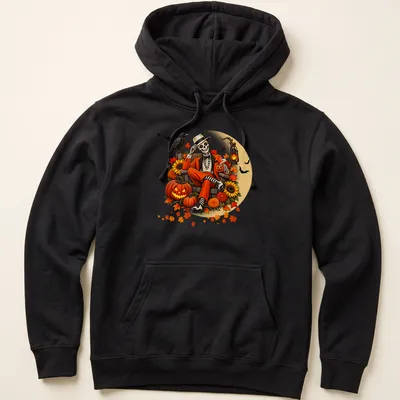 Vintage illustration of a skeleton sitting with pumpkins and autumn leaves — printed on a unisex hoodie