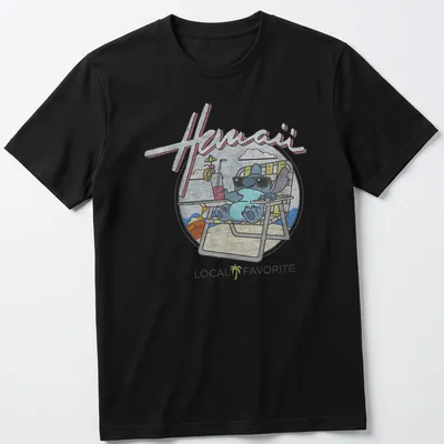 Cartoon alien character on a Hawaii Local Favorite t-shirt with colorful text