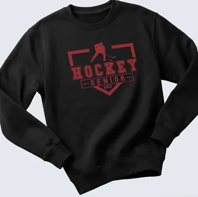 Bold graphic t-shirt featuring a hockey player and graduation year 2027 — printed on a unisex sweatshirt
