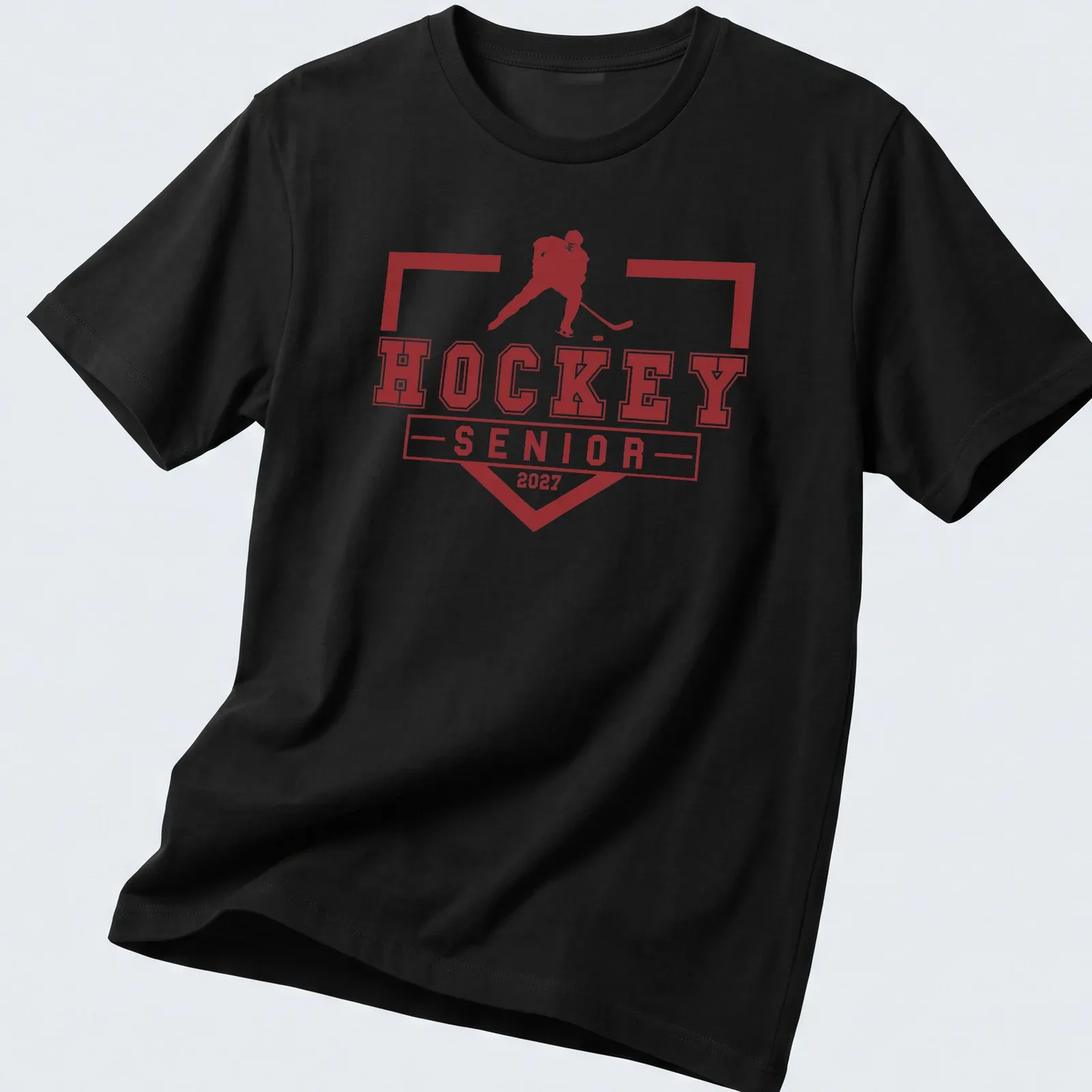 Bold graphic t-shirt featuring a hockey player and graduation year 2027 — printed on a unisex t-shirt