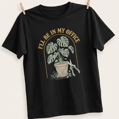 Vintage botanical shirt featuring a houseplant and text about being in the office