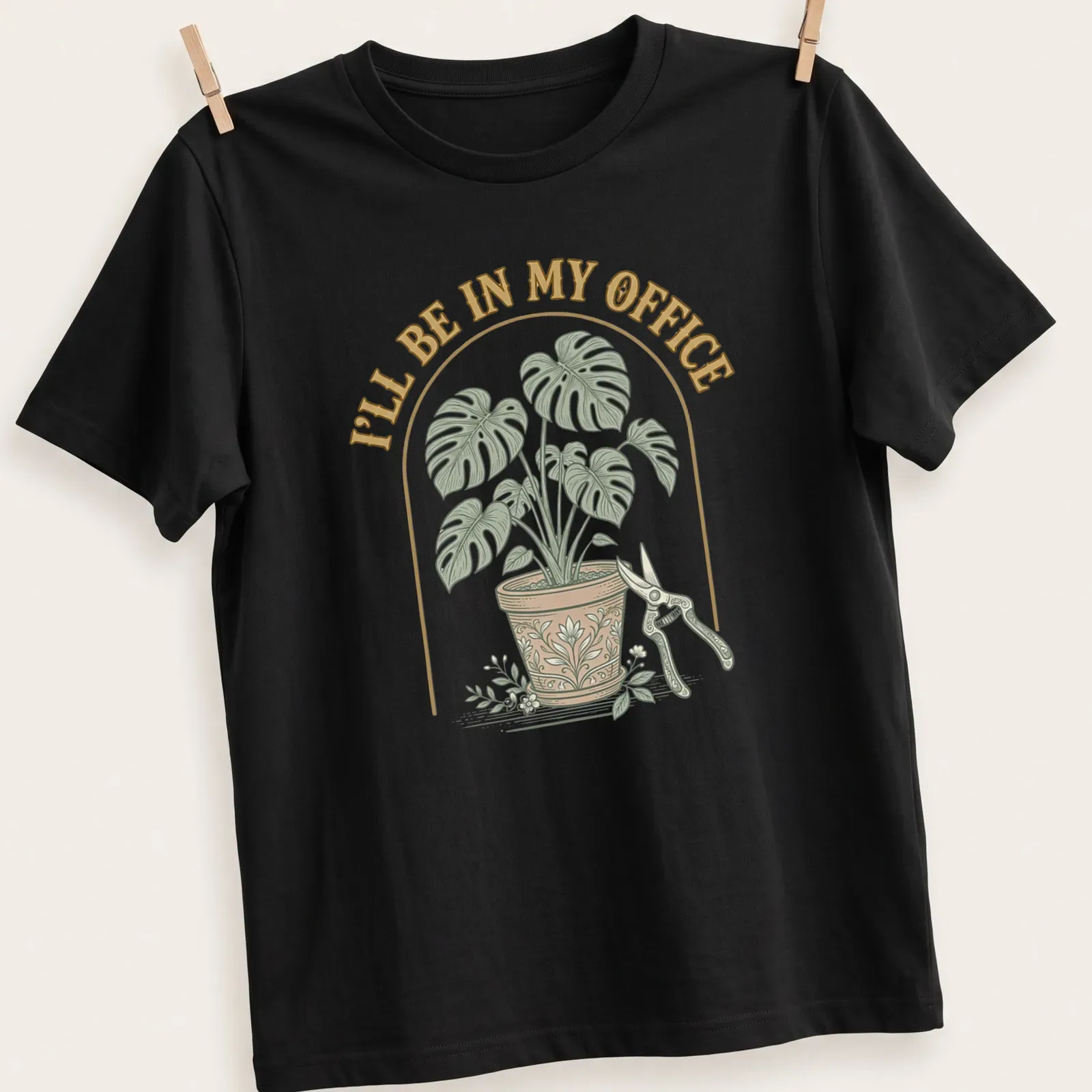 Vintage botanical shirt featuring a houseplant and text about being in the office — printed on a unisex t-shirt