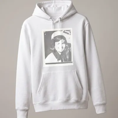 Pop art illustration of Jacqueline Kennedy in black, white, and gray — printed on a unisex hoodie
