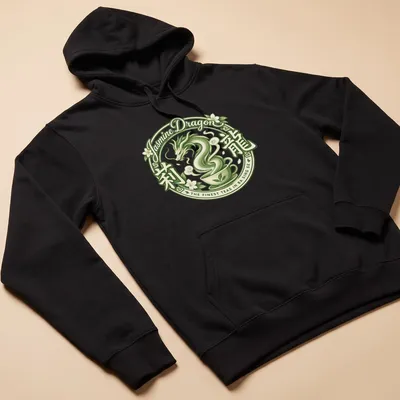 Vintage circular design of a dragon and teacup with tea-themed text — printed on a unisex hoodie