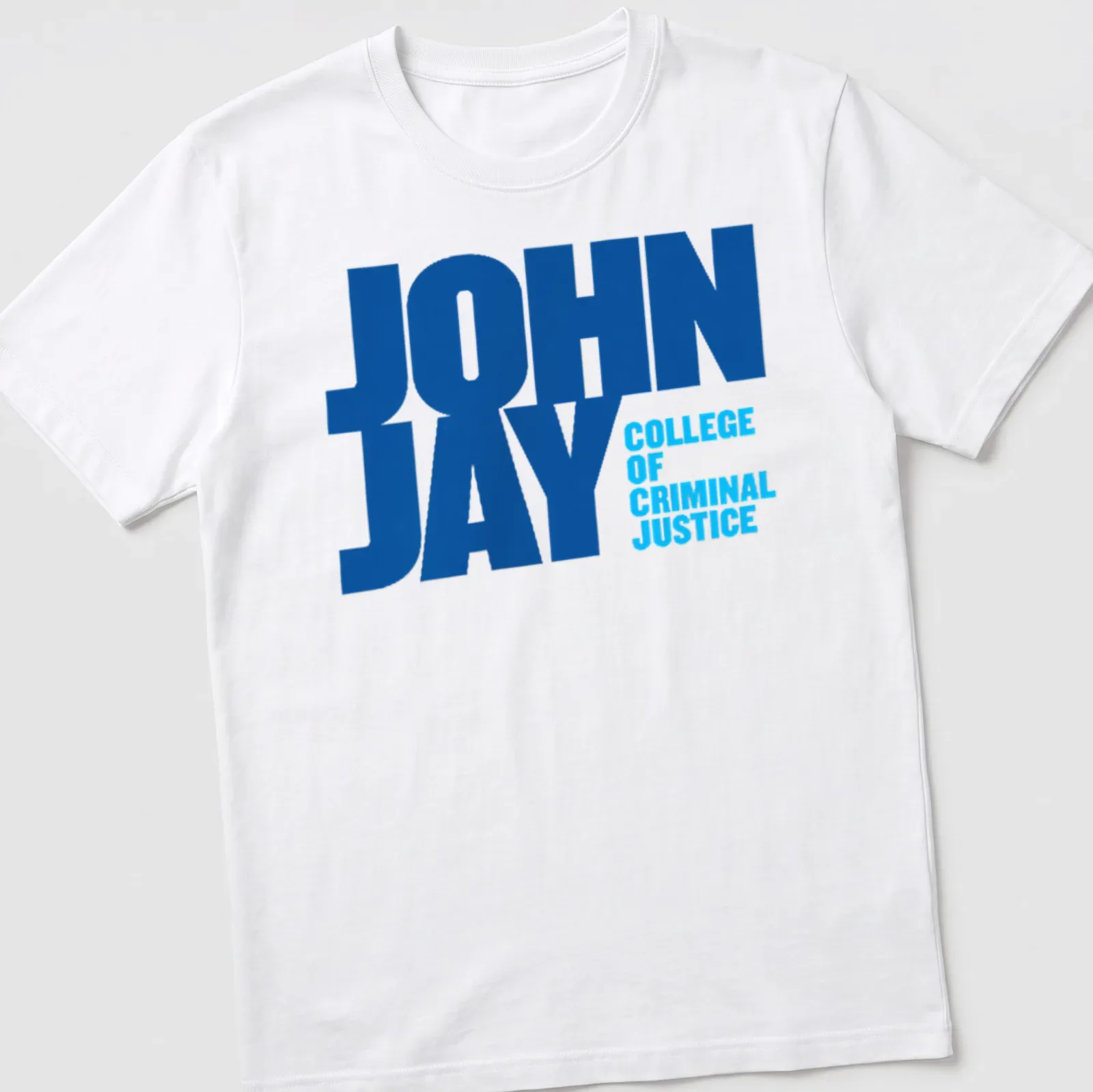 Bold typography John Jay College of Criminal Justice t-shirt in blue and white — printed on a unisex t-shirt