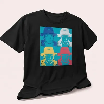 Pop Art T-shirt featuring Joseph Beuys with vibrant colors and text. — printed on a unisex t-shirt (angled view)