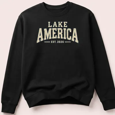 Vintage design featuring Lake America EST. 2026 text in cream, navy, and beige. — printed on a unisex sweatshirt