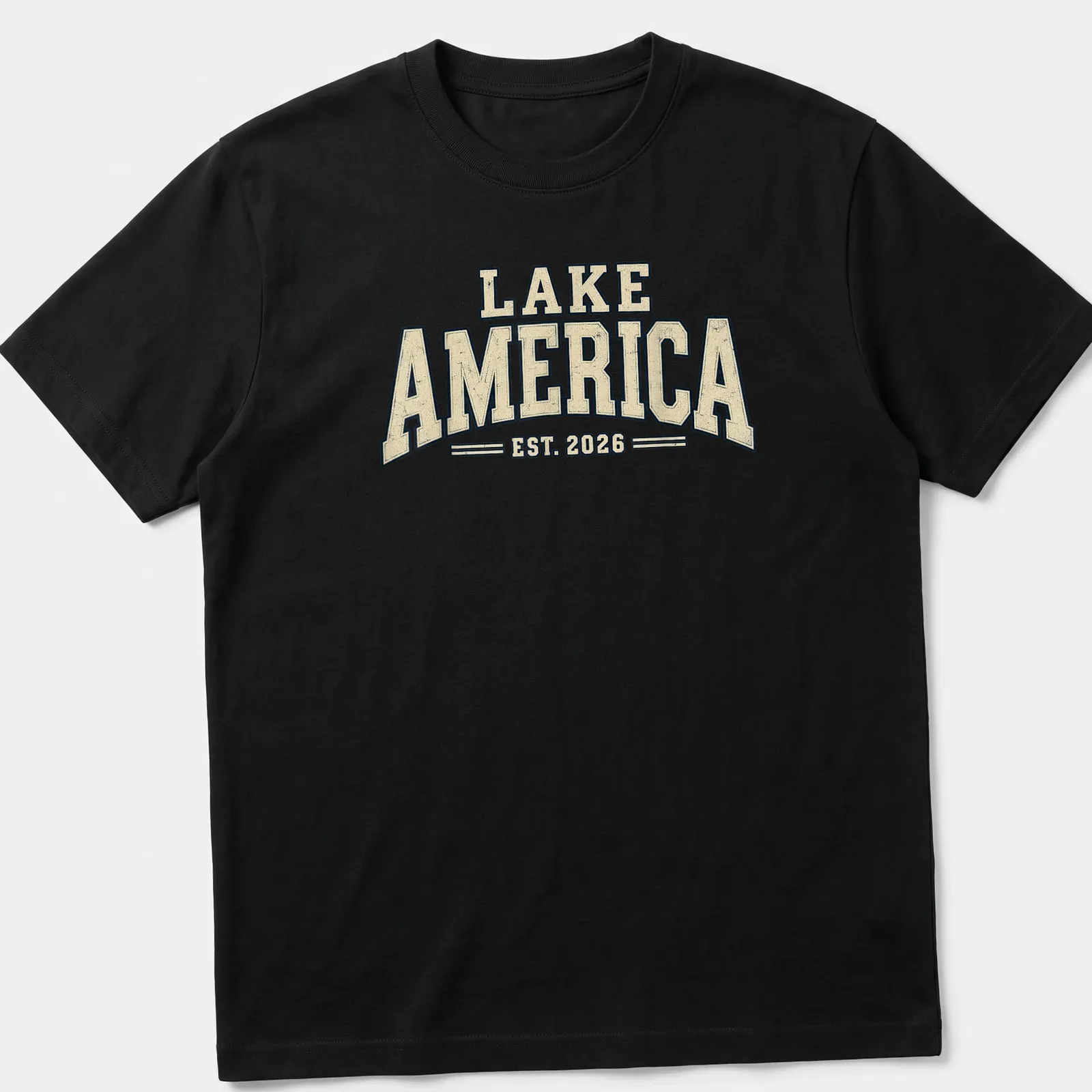 Vintage design featuring Lake America EST. 2026 text in cream, navy, and beige. — printed on a unisex t-shirt