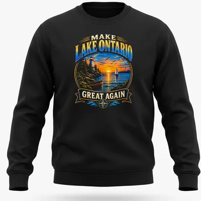 Vibrant landscape of Lake Ontario at sunset with a lighthouse and sailboat. — printed on a unisex sweatshirt