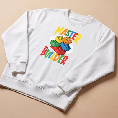 Colorful LEGO Master Builder t-shirt with bold typography in multiple colors. — printed on a unisex sweatshirt