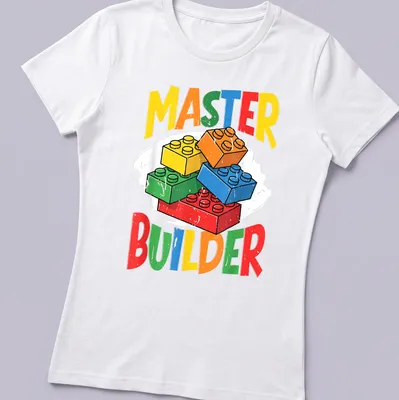 Colorful LEGO Master Builder t-shirt with bold typography in multiple colors. — printed on a women's shirt