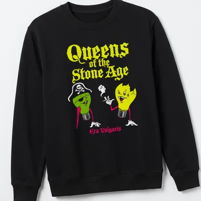 Cartoonish lightbulb design with text 'Queens of the Stone Age Era Vulgaris' in yellow, green, white, and red — printed on a unisex sweatshirt