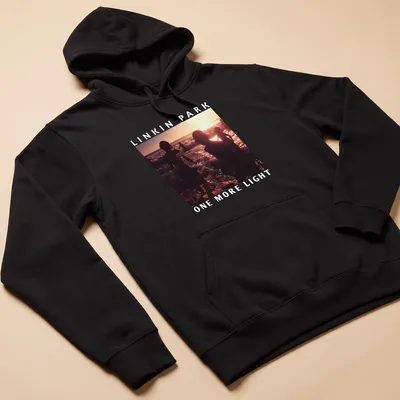 Silhouetted figures in water at sunset with Linkin Park text — printed on a unisex hoodie