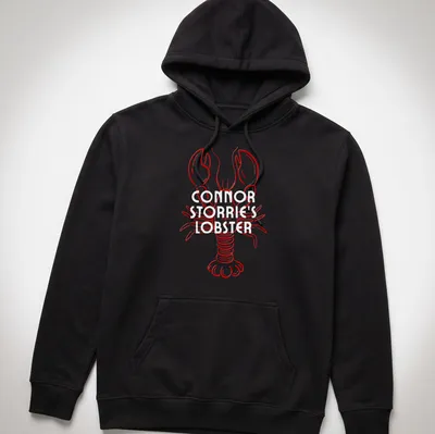 Line-art lobster illustration in red on a T-shirt resembling a magazine cover — printed on a unisex hoodie