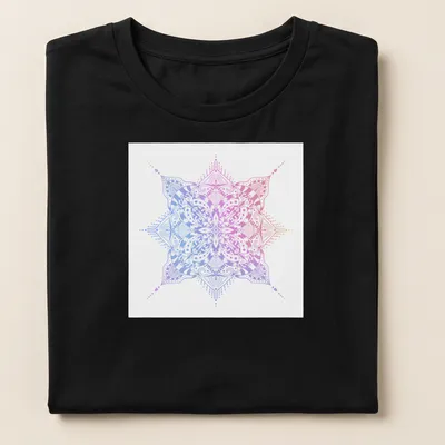 Intricate mandala line art in pink, purple, blue, and white — printed on a women's shirt