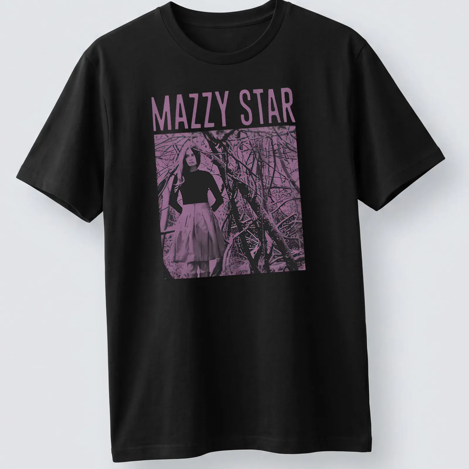 Vintage Mazzy Star t-shirt featuring a woman in a skirt and bold lettering. — printed on a unisex t-shirt