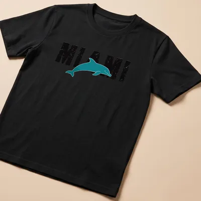 Retro distressed Miami Dolphin t-shirt featuring a dolphin and bold text.
