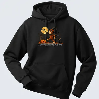 Whimsical illustration of a monkey in a witch hat with playful text — printed on a unisex hoodie