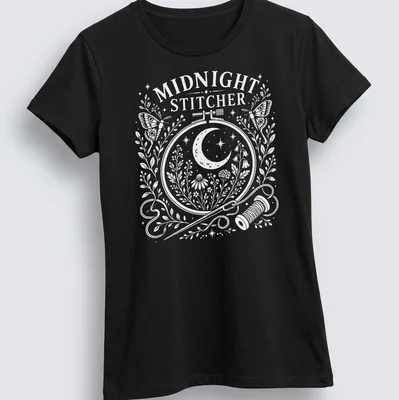 Folk art moon moth with text 'Midnight Stitcher' in pastel colors — printed on a women's shirt