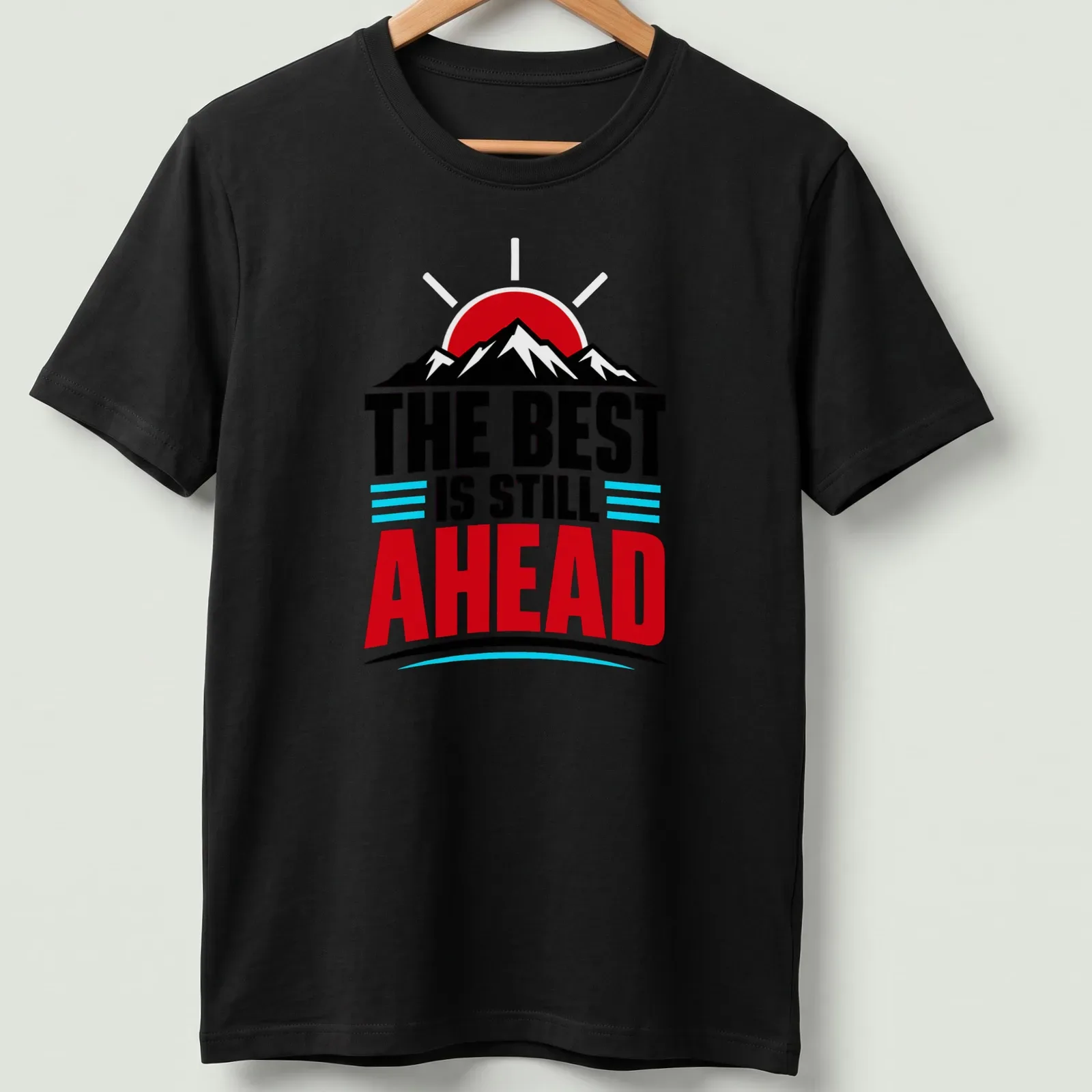 Bold graphic of a mountain landscape with inspirational text in red and blue — printed on a unisex t-shirt