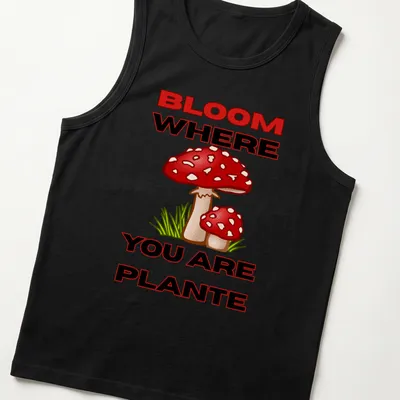 Colorful cartoon mushroom design with the text 'BLOOM WHERE YOU ARE PLANTE' in vibrant colors. — printed on a tank top