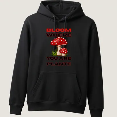 Colorful cartoon mushroom design with the text 'BLOOM WHERE YOU ARE PLANTE' in vibrant colors. — printed on a unisex hoodie