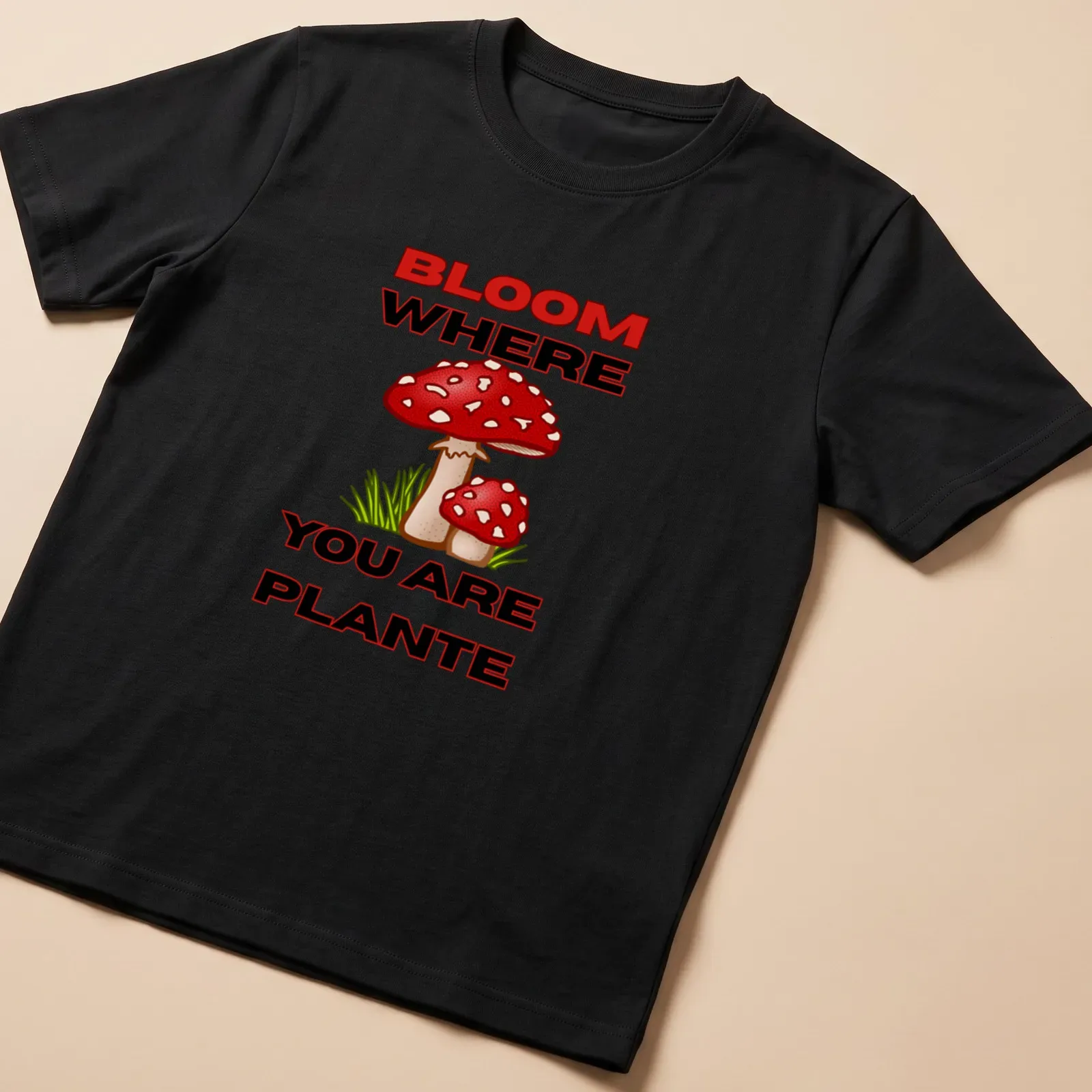 Colorful cartoon mushroom design with the text 'BLOOM WHERE YOU ARE PLANTE' in vibrant colors. — printed on a unisex t-shirt