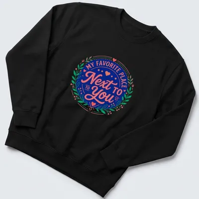 Vintage badge design tee with romantic text in navy, pink, and green. — printed on a unisex sweatshirt