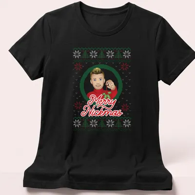 Festive cartoon t-shirt with Merry Nickmas text and Nick Carter illustration — printed on a women's shirt