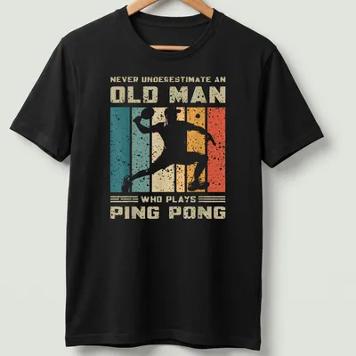 Vintage distressed tee featuring an old man playing ping pong with humorous text