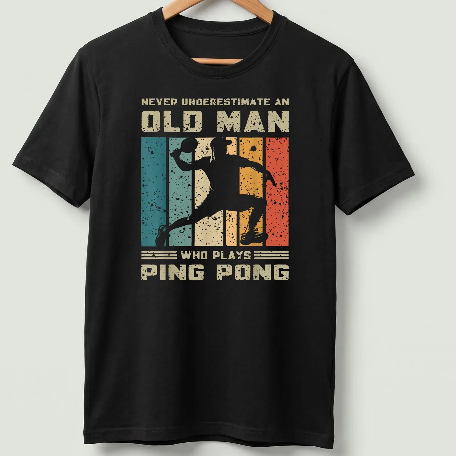 Vintage distressed tee featuring an old man playing ping pong with humorous text — printed on a unisex t-shirt