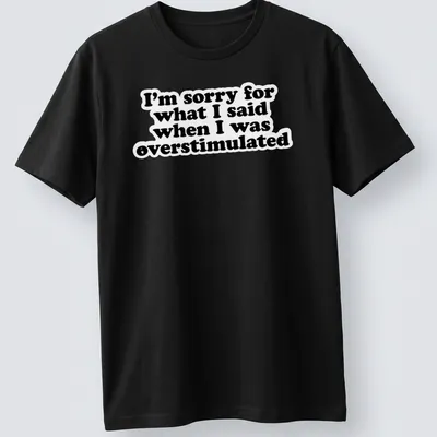 Bold typography t-shirt in black and white with an apology for overstimulation