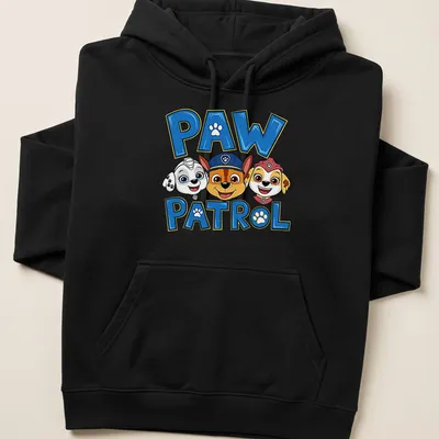 Colorful Paw Patrol T-shirt featuring characters with bold lettering — printed on a unisex hoodie