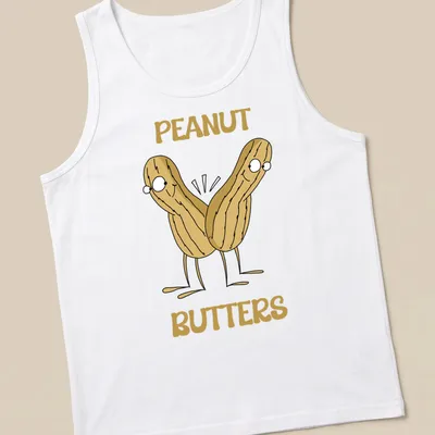 Cartoon design of peanuts with the text PEANUT BUTTERS in beige and brown — printed on a tank top