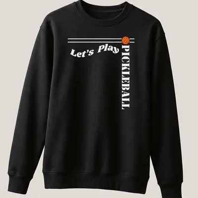Bold modern design featuring 'Let's Play PICKLEBALL' on an orange background — printed on a unisex sweatshirt