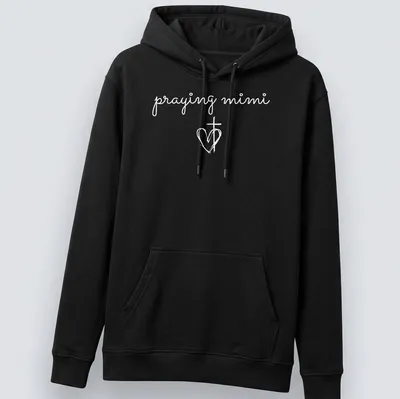 Simple white T-shirt featuring a heart and cross with 'praying mimi' text — printed on a unisex hoodie